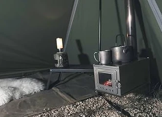 Palapinės su pečiuku nuoma – patogus poilsis gamtoje!